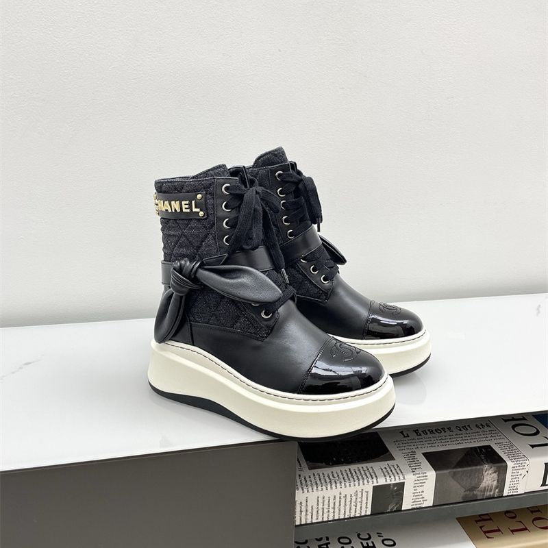 Chanel platform lace-up boots