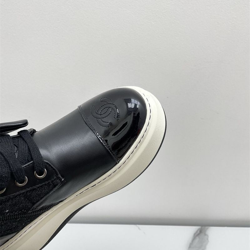 Chanel platform lace-up boots