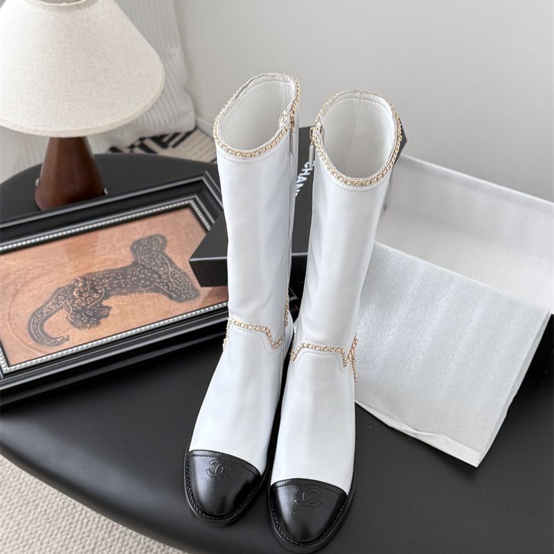 Chanel mid-calf boots.