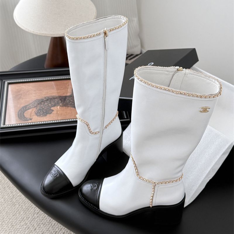 Chanel mid-calf boots.
