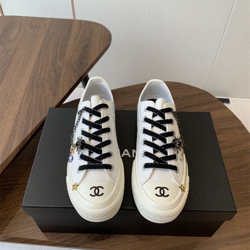 Chanel white low-top canvas sneakers