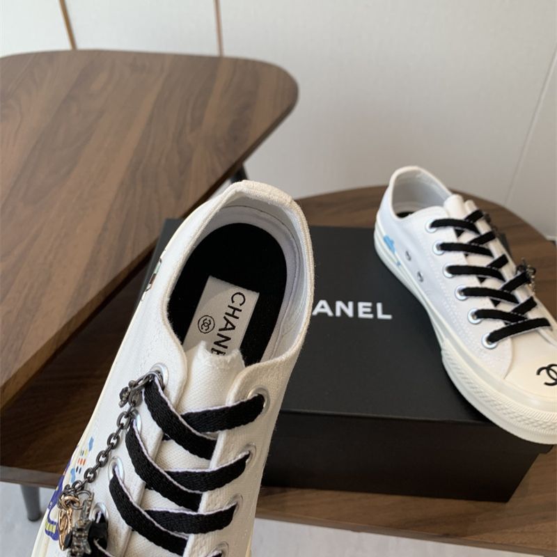 Chanel white low-top canvas sneakers