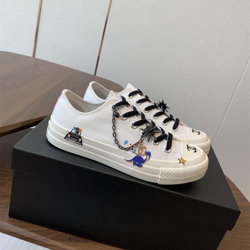 Chanel white low-top canvas sneakers