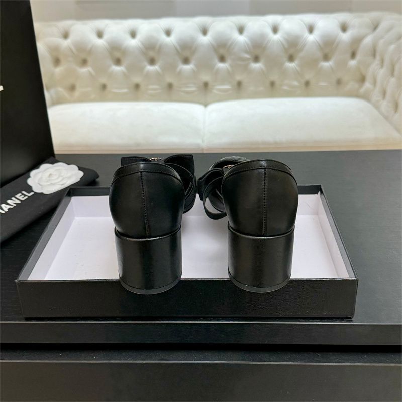 Chanel Mary Jane flats with a bow