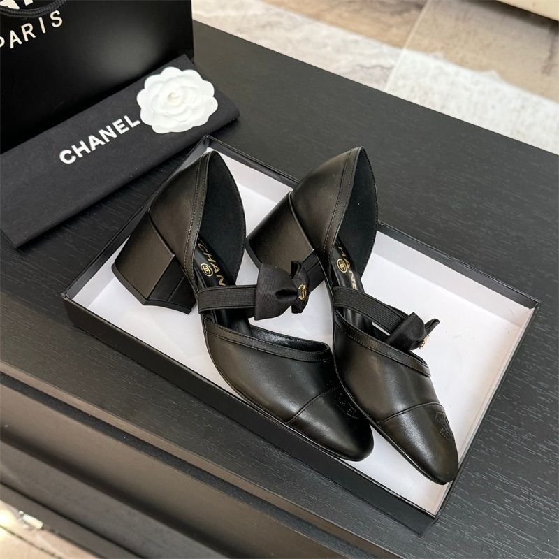 Chanel Mary Jane flats with a bow