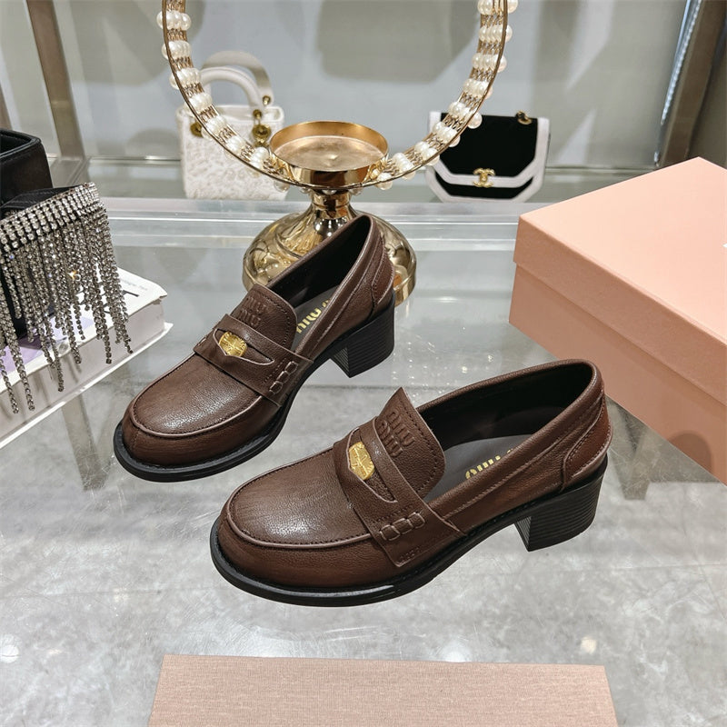 Miu Miu Decò Calf Leather Loafers.