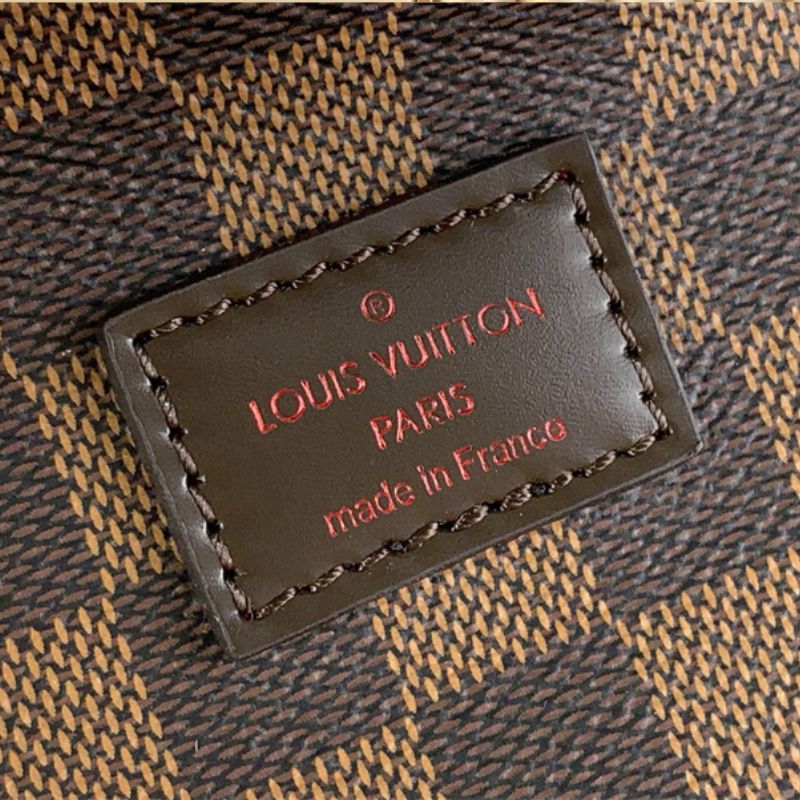 Louis Vuitton Saumur handbag in the Damier Ebene canvas
