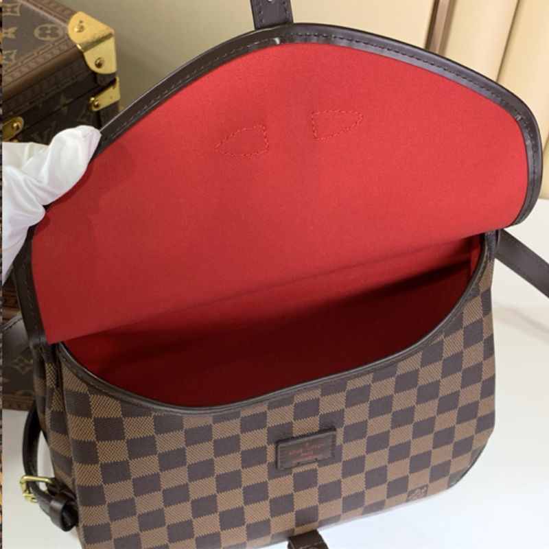 Louis Vuitton Saumur handbag in the Damier Ebene canvas