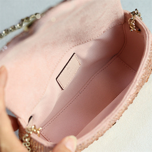 Gucci GG Marmont Crystal Small Shoulder Bag in pink matelassé leather.