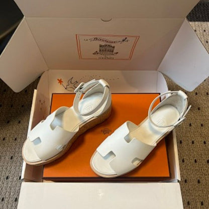 Hermès Eze Sandals in white calfskin.