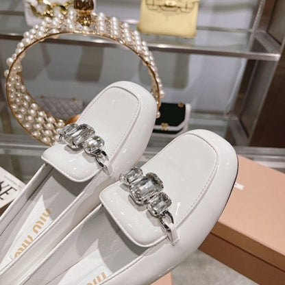 Miu Miu Embellished Patent Leather Pumps