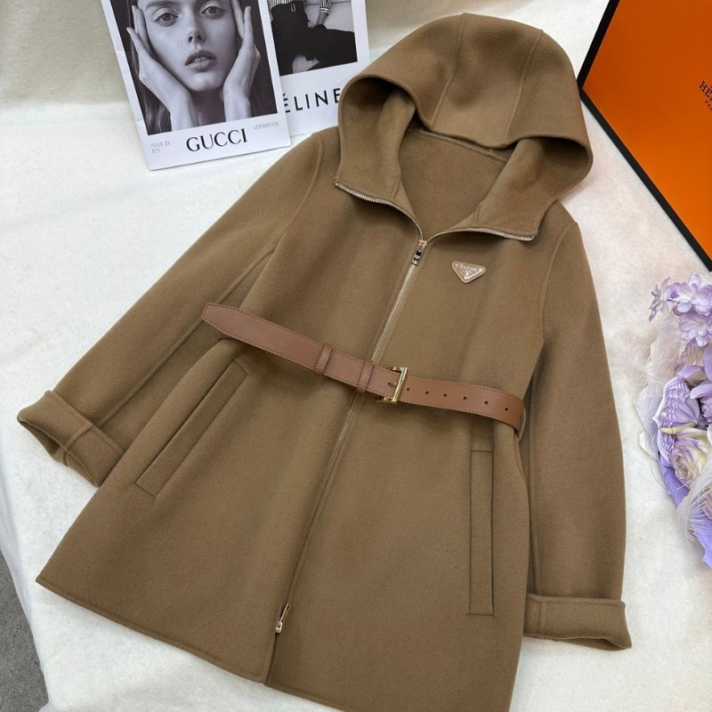 Prada hooded coat with a belt.