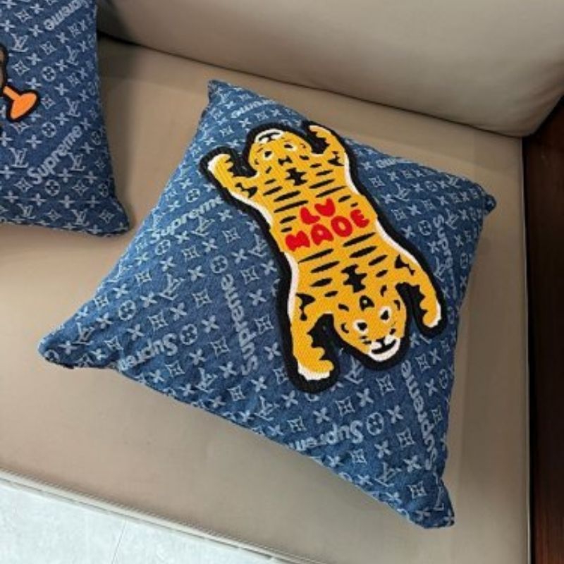 Louis Vuitton x Nigo x Supreme collaboration throw pillow,