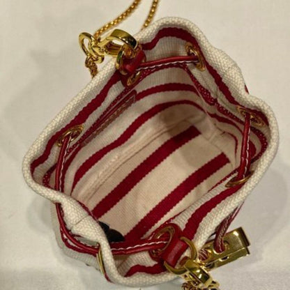 ada Crochet and Striped Canvas Bucket Bag.