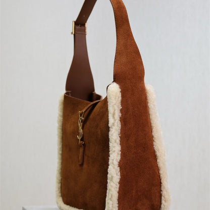 Saint Laurent Le 5 à 7 Small Shearling Shoulder Bag.