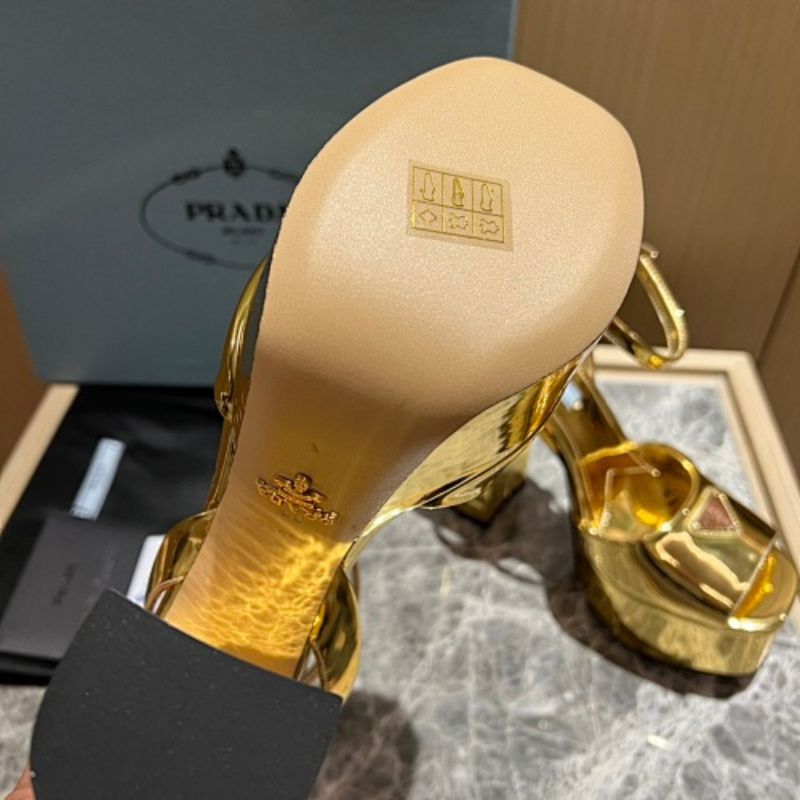 Prada Metallic Leather Platform Sandals in a luxurious liquid gold colorway.