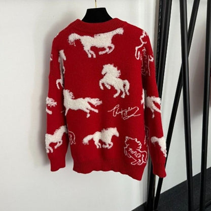 Hermès red knit sweater featuring a white horse motif