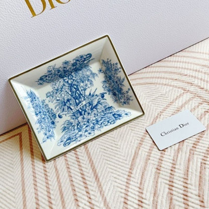 Dior Maison collection the iconic Toile de Jouy motif in blue and white.