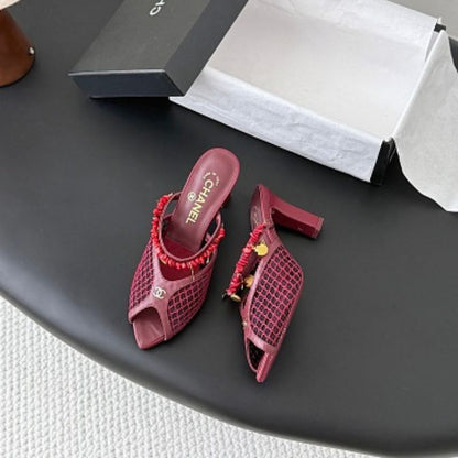 Chanel Coral Charm Mesh Open-Toe Mules in deep burgundy-red.