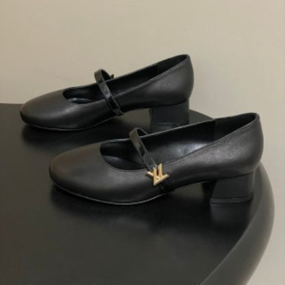Louis Vuitton Darling Ballerinas in black.