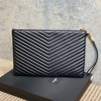 Saint Laurent Matelassé leather pouch with a wrist strap
