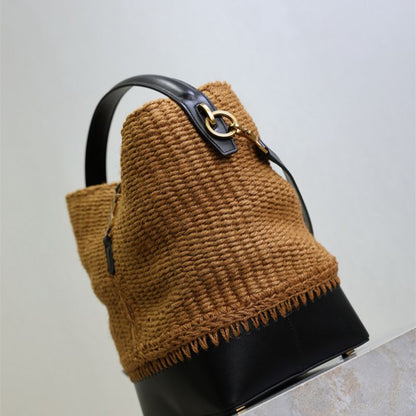 Saint Laurent Le 37 bucket bag in raffia and leather.