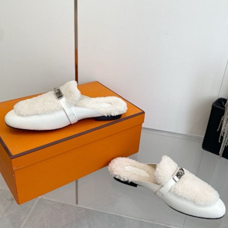 Hermès Carlotta Mules in a Blanc (white) leather and shearling variation