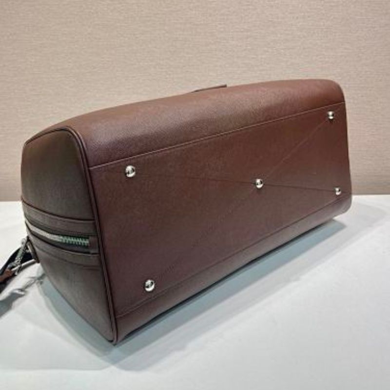 Prada Saffiano Leather Travel Bag in a rich cocoa brown.