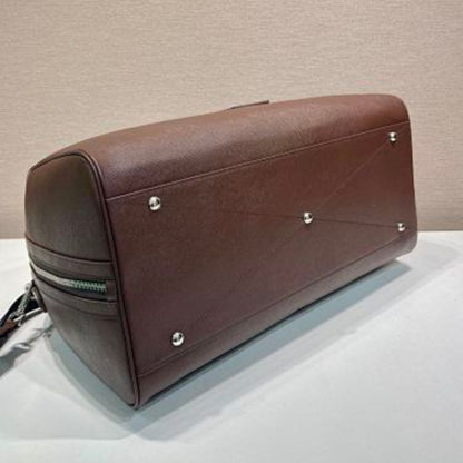 Prada Saffiano Leather Travel Bag in a rich cocoa brown.