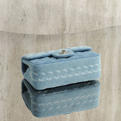Chanel Mini Square Flap Bag crafted from blue denim.
