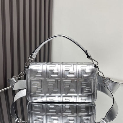 Fendi Baguette bag in a metallic silver finish.