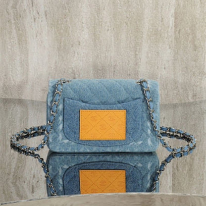 Chanel Mini Square Flap Bag crafted from blue denim.