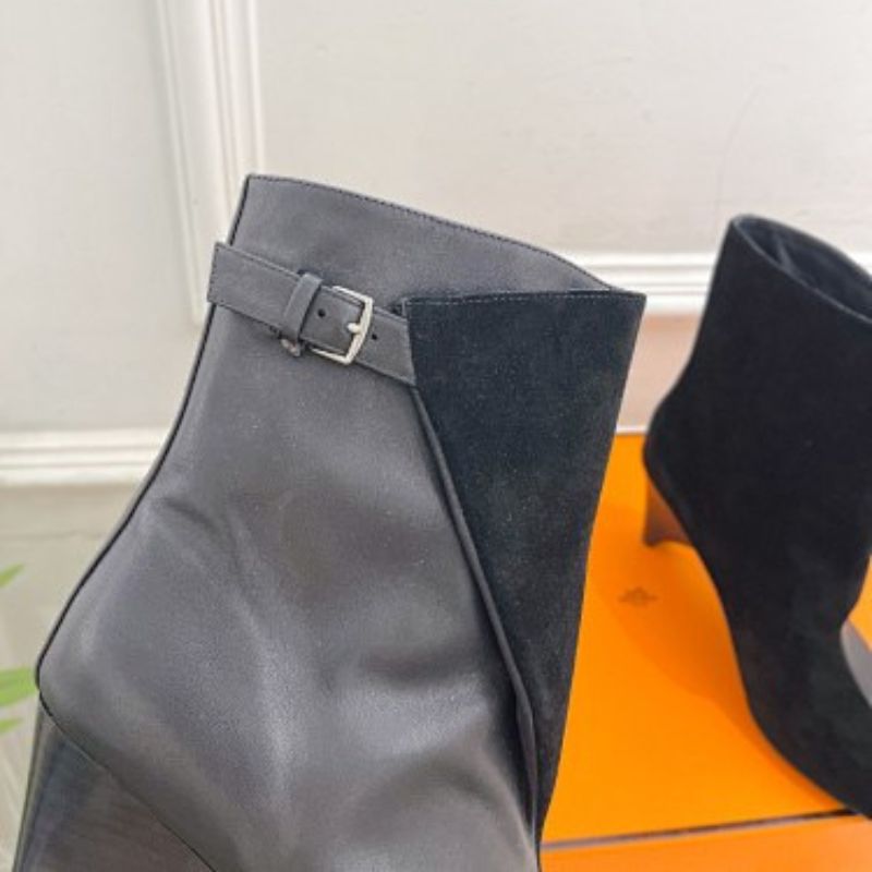 Hermès Rouxa Ankle Boots in a classic noir (black) finish.
