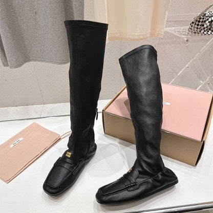Miu Miu "Loafer" Knee-High Boots.