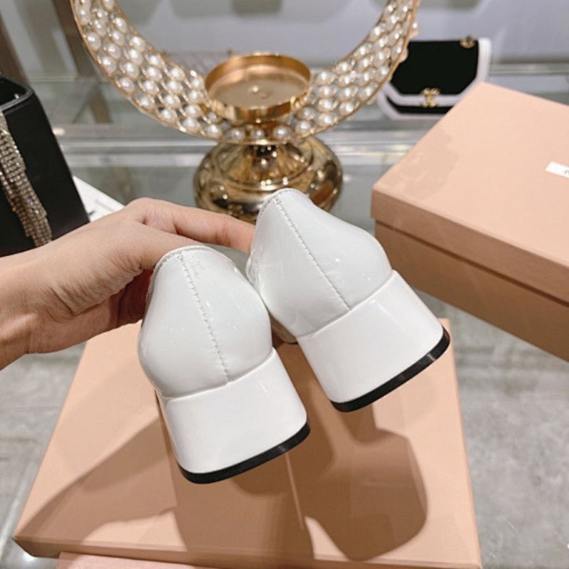 Miu Miu Embellished Patent Leather Pumps