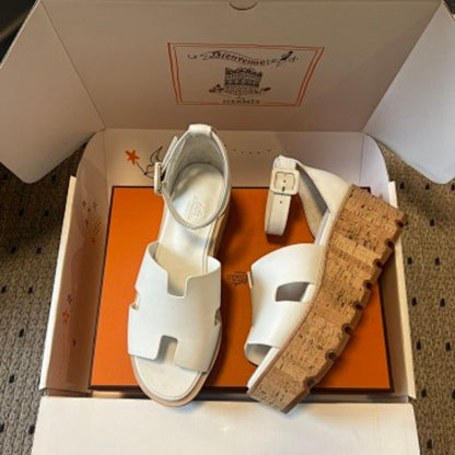 Hermès Eze Sandals in white calfskin.