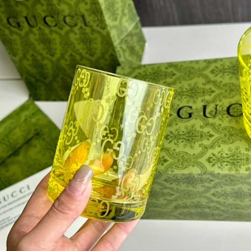 Gucci yellow-tinted crystal tumblers,