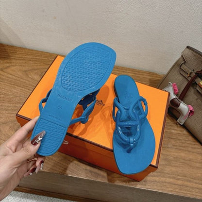Hermès Égérie Sandals in a vibrant blue rubber