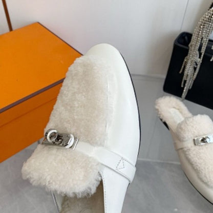 Hermès Carlotta Mules in a Blanc (white) leather and shearling variation