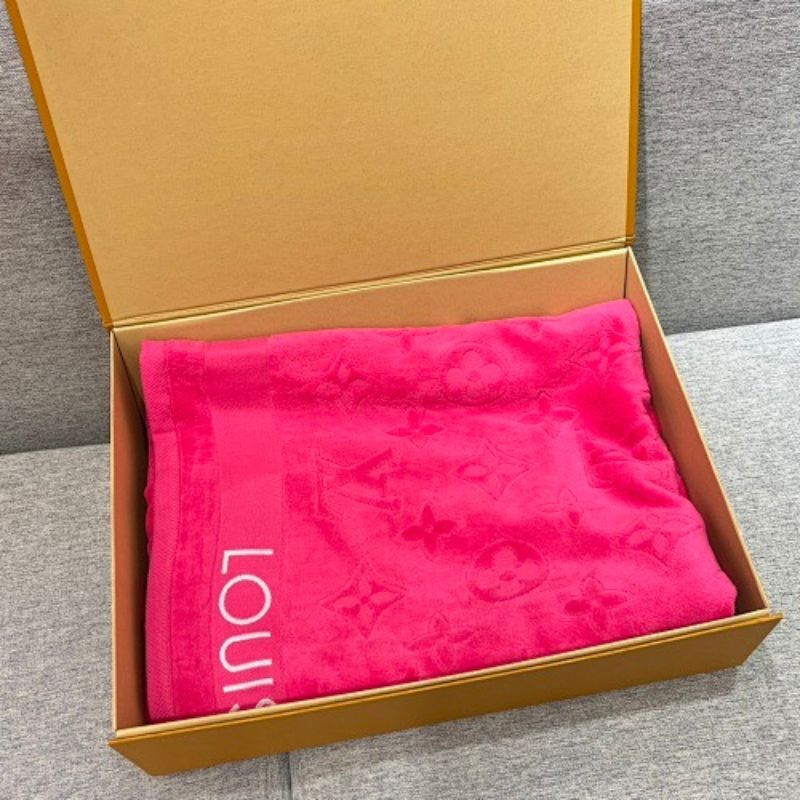 LVacation Beach Towel and Cushion Sets by Louis Vuitton.