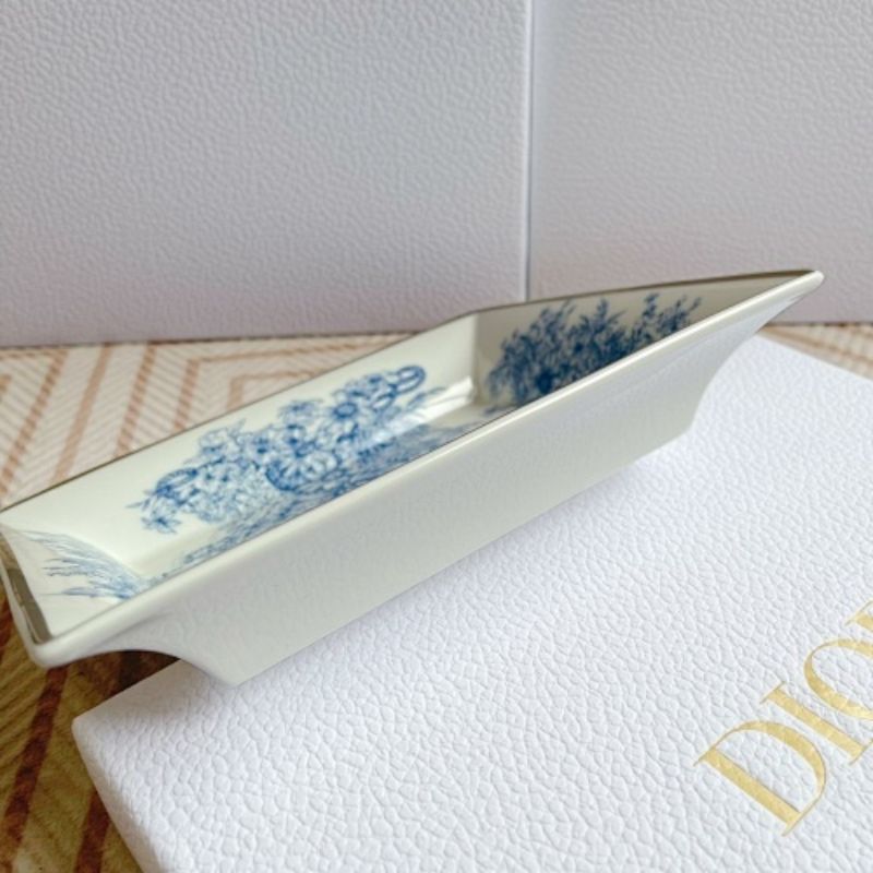 Dior Maison collection the iconic Toile de Jouy motif in blue and white.