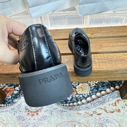 Prada Levitate Brushed Leather Brogues in classic black ("Nero").