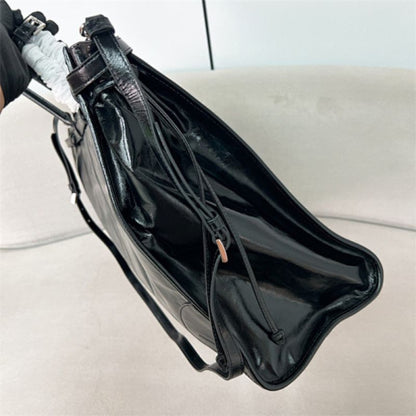 Prada Bonnie Extra-large Leather Handbag in black.