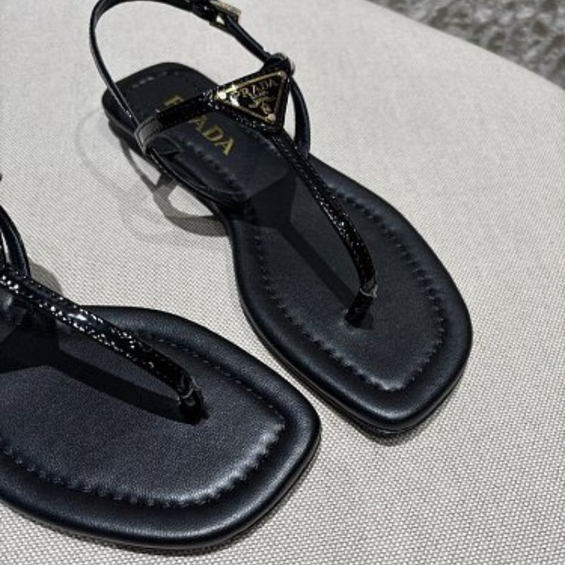 Prada Patent Leather T-Strap Enameled Triangle Logo Sandals.