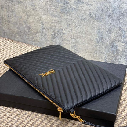 Saint Laurent Matelassé leather pouch with a wrist strap