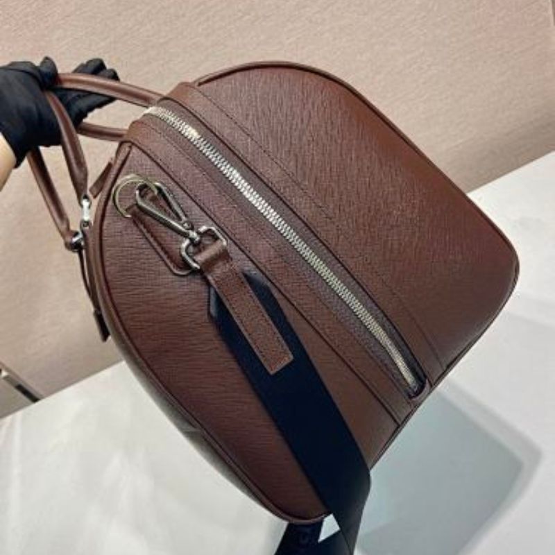 Prada Saffiano Leather Travel Bag in a rich cocoa brown.