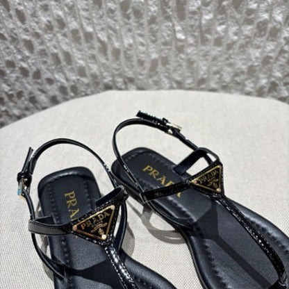Prada Patent Leather T-Strap Enameled Triangle Logo Sandals.