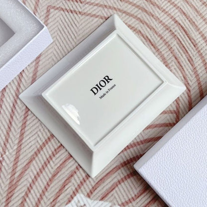 Dior Maison collection the iconic Toile de Jouy motif in blue and white.