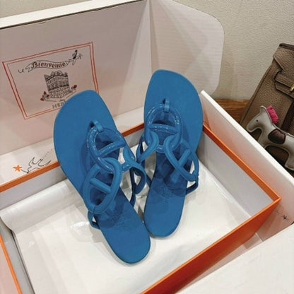 Hermès Égérie Sandals in a vibrant blue rubber