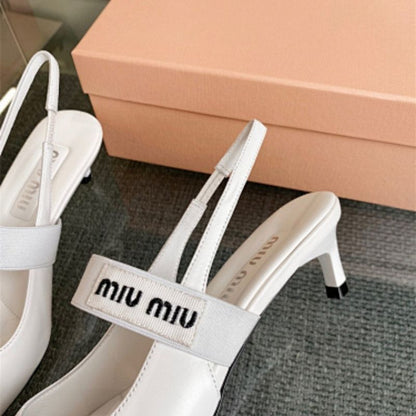 Miu Miu Patent Leather Slingback Pumps With Straps